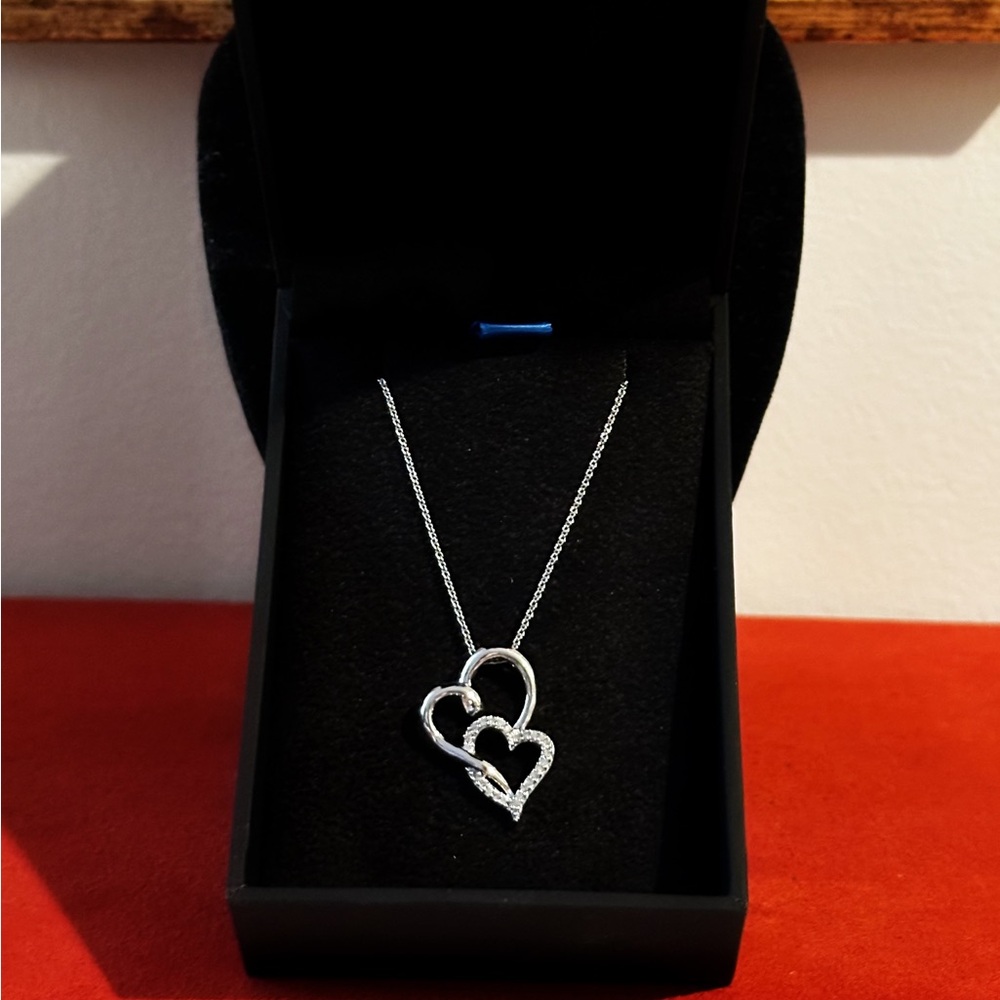 New in box - Beautiful Diamond Accent 2-Heart Pendant